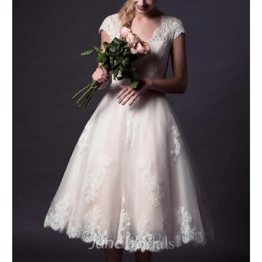 Ivory A-Line Wedding Dress with Bateau Neckline and Flutter Cap Sleeves